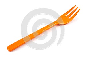Orange plastic forks isolated