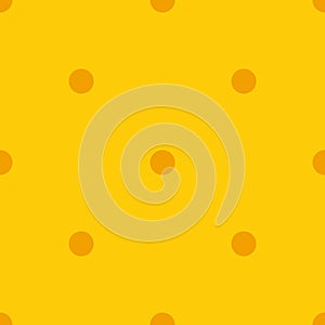 Orange polka dots seamless pattern on yellow.