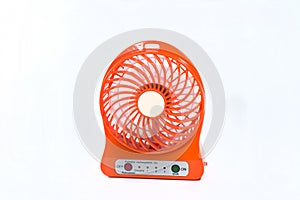 An orange portable fan isolated on white background