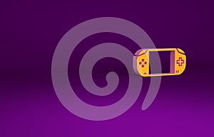 Orange Portable video game console icon isolated on purple background. Gamepad sign. Gaming concept. Minimalism concept