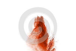 Orange powder explosion isolated on white background