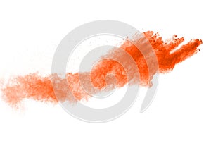 Orange powder explosion on white background.