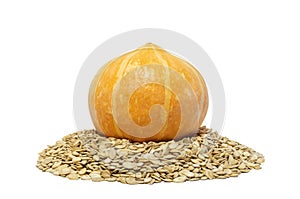 Orange pumpkin and its seeds on an isolated white background