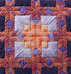 Orange and Purple Needlepoint Detail photo