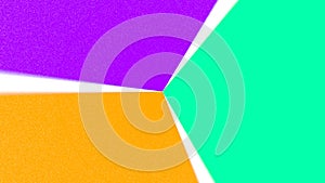 Orange purple & teal color paper spinning in a rotating wheel of rough textured paper shapes