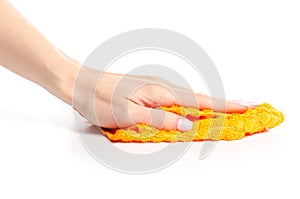 The orange rag cloth in hand