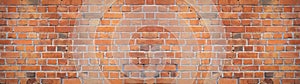 Orange red damaged rustic brick wall brickwork stonework masonry texture background banner panorama