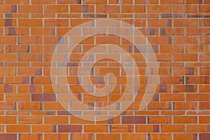 Background of aged orange and red brick wall. Brick background