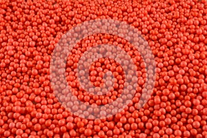 Orange red polystrene ball background photo
