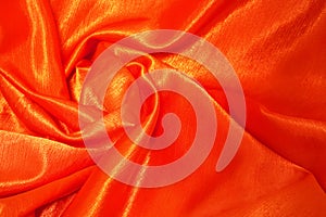 Orange-red satin fabric