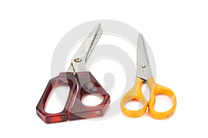 orange and red scissors. dirty. isolated on white background