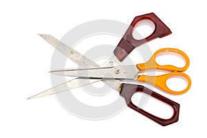 orange and red scissors. dirty. isolated on white background