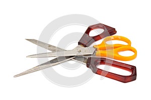 orange and red scissors. dirty. isolated on white background