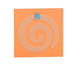 Orange reminder note with blue pin
