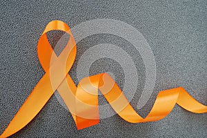 Orange Ribbon for Healthcare and World cancer day concept.