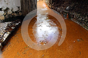 Orange river of sulphide fumaroles in the town of Furnas on the island of San Miguel.