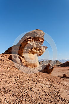 Orange rock in shape of mushroom