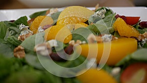 Orange in rocket salad