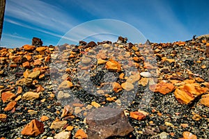 Orange rocks dot the landscape in the badlands. Drumheller Alberta,Canada