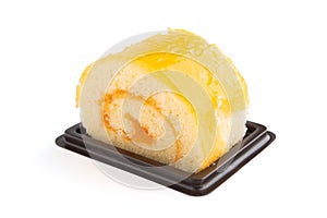 Orange roll cake on white background