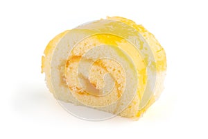 Orange roll cake on white background