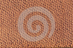 Orange rough plaster wall texture