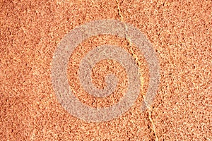 Orange rough stone texture closeup background