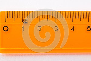 Orange ruler closeup