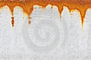 Orange rust patterns on a galvanised steel metal surface
