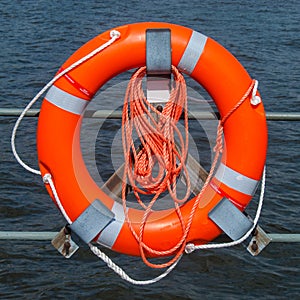 Orange safety ring and rope