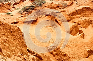 Orange sand dunes texture as background