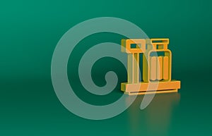 Orange Scale with suitcase icon isolated on green background. Logistic and delivery. Weight of delivery package on a