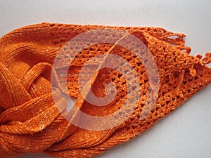 Orange scarf knitted texture