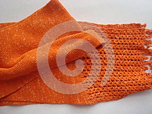 Orange scarf knitted texture