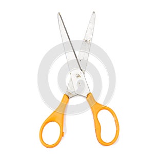 orange scissors. dirty. isolated no white background