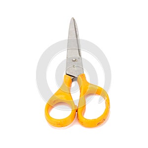 orange scissors. dirty. isolated no white background