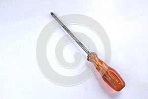 Orange screwdriver isolated on white background.