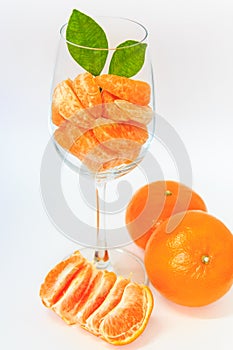 Orange with segment in glass.