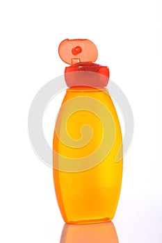 Orange shampoo bottle