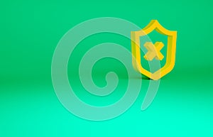 Orange Shield with cross mark icon isolated on green background. Shield and rejected. Notice of refusal. Minimalism