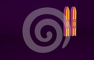 Orange Ski and sticks icon isolated on purple background. Extreme sport. Skiing equipment. Winter sports icon