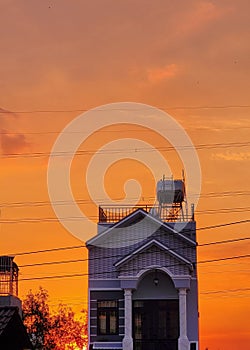 Orange sky in Hochiminh city photo