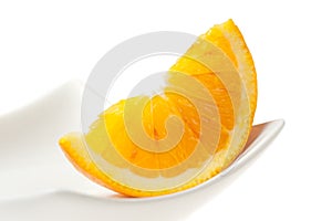 Orange Slice Closeup on White Plate
