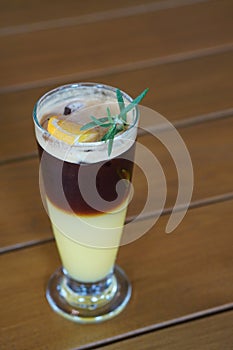 orange slice and green leaves, americano yuzu in glass cup on wooden floor background, food, drink, object, cool, copy space