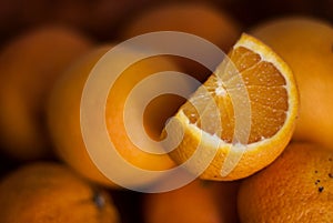 Orange slice and oranges on the background