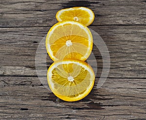 Orange sliced on wooden table