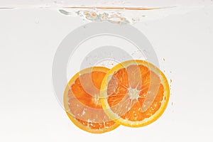 Slices bubbling in water