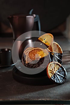 Orange slices in chocolate. Snack of dried orange slices. Dried orange slices.Sweet dessert.