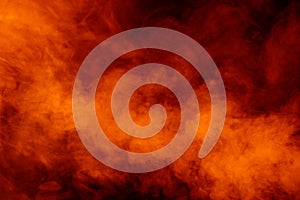 Orange smoke on black background