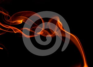 Orange smoke on black background